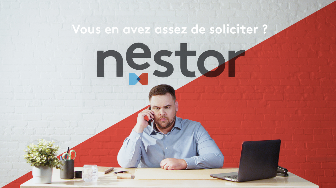 man talking on phone at desk ad, Nestor